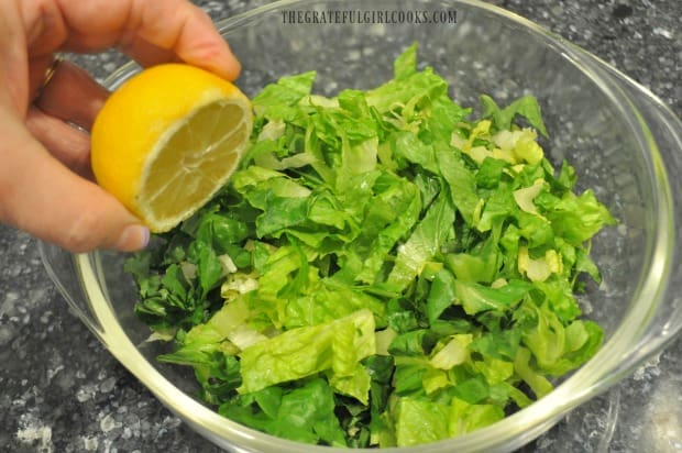 Fresh lemon juice brings out the flavor in a chicken caesar salad.