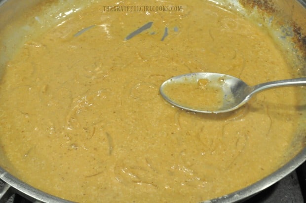 Coconut milk sauce is reduced in volume before serving.