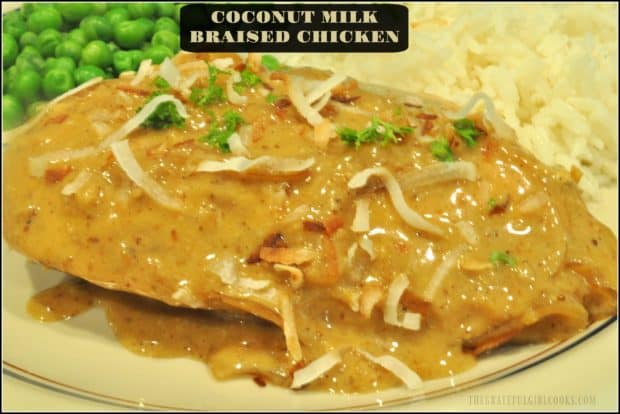 Easy Coconut Milk Braised Chicken - big flavor, low calorie (under 300)! Pan seared seasoned breasts are cooked in/topped with a spiced coconut milk sauce. YUM!