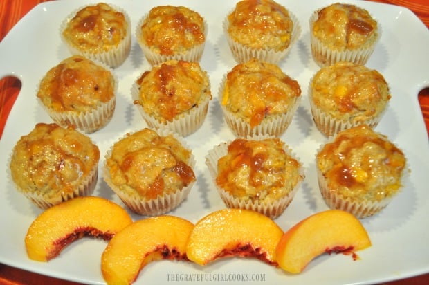 One dozen peach jam muffins on white serving tray, ready to eat!