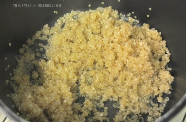 Quinoa is cooked to add to Thai salad.