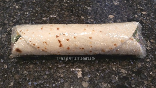 Turkey ranch rollups are rolled tightly, then wrapped in plastic wrap and refrigerated.