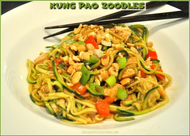 Kung Pao Zoodles is a low calorie (under 300), low carb dish using spiralized zucchini noodles, cooked in a sweet/spicy Asian sauce, w/or without chicken.