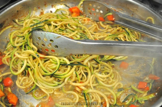 Zoodles (zucchini noodles) are cooked in the Kung Pao sauce.