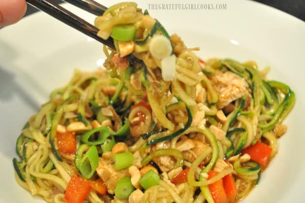 Chopsticks lifting up a bite of Kung Pao Zoodles!