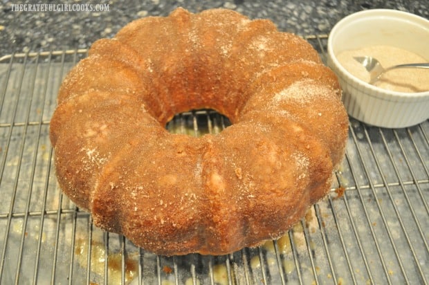 Apple cider bundt cake gets a second coating of cinnamon sugar topping.