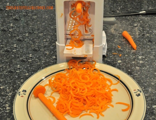 Spiralized carrot salad uses fresh carrots that have been peeled in curly strips.