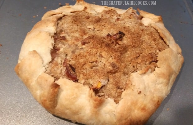 The peach galette is golden brown and flaky when it comes out of oven.