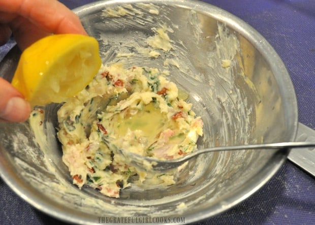 Fresh lemon juice is added to garlic bacon butter for roast cod.