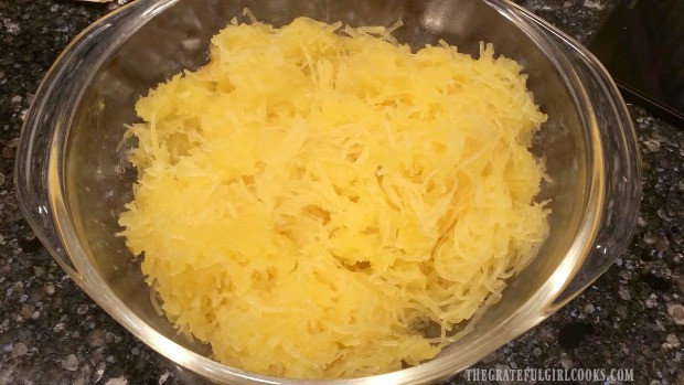 Spaghetti squash strands are in bowl, and are ready to eat or use in other recipes!