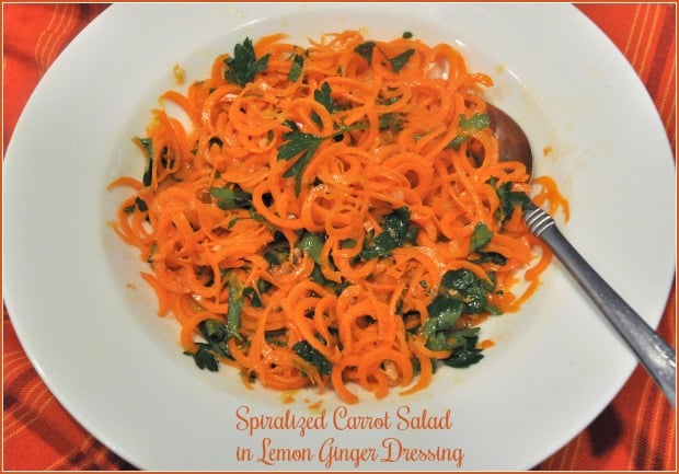 Spiralized Carrot Salad in Lemon Ginger Dressing is a delicious, fresh veggie side dish! It is easy to make, using a vegetable peeler OR spiralizer!