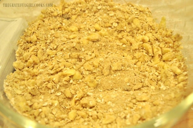 Streusel topping is blended, and ready to put on top of apple pie dessert pizza.