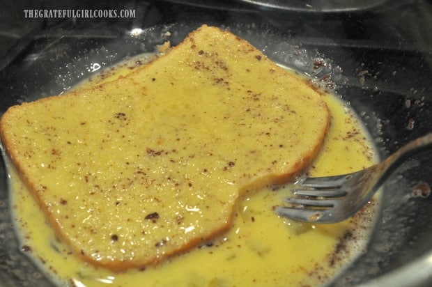 Bread is turned and coated on both sides with classic french toast batter.