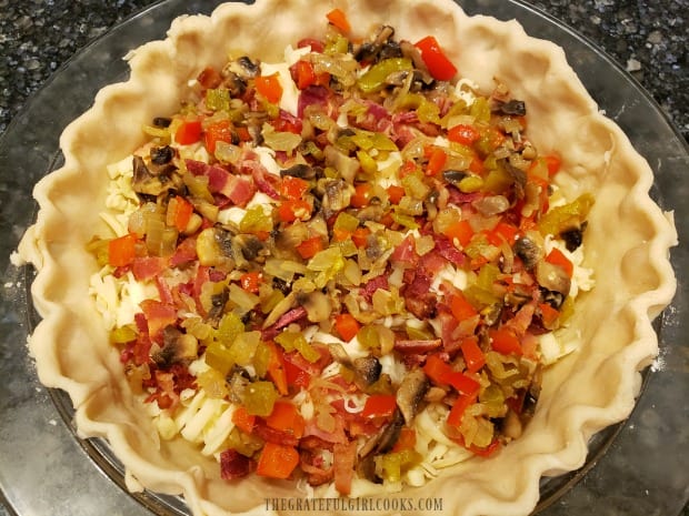 Veggie filling is added to bacon and cheese in this Southwestern bacon quiche.