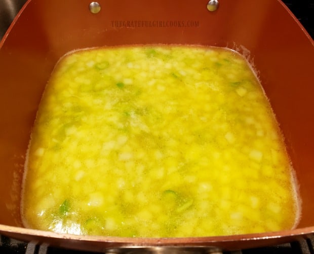 Cooking the veggies and broth to add to the easy cornbread stuffing mix.