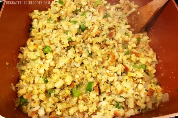 Easy cornbread stuffing is fluffed up in pan, after absorbing the broth.