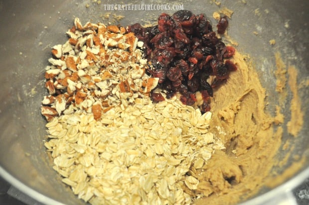 Rolled oats, dried cranberries and pecans are added to the cookie dough,