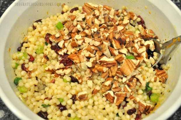 Toasted, chopped pecans are added to the cranberry orange Israeli couscous, before serving.