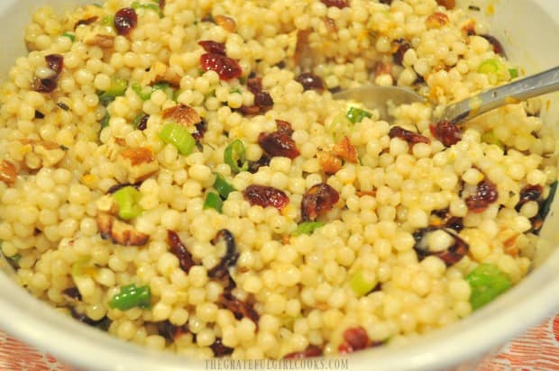 Cranberry orange Israeli couscous is chilled to blend flavors, then served.