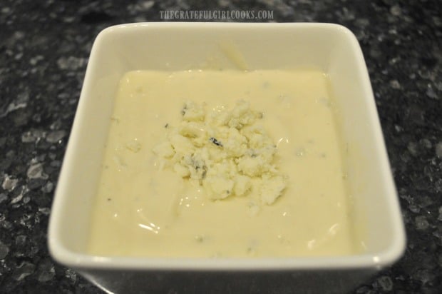 Bleu cheese dressing is ready to serve with the buffalo honey hot wings.