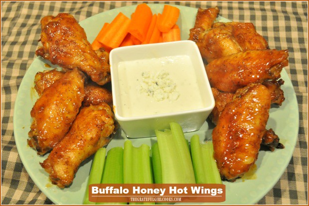 Buffalo Honey Hot Wings are the perfect appetizer for a crowd! Yummy chicken wings are covered in a mild buffalo honey sauce, and are baked, not fried!