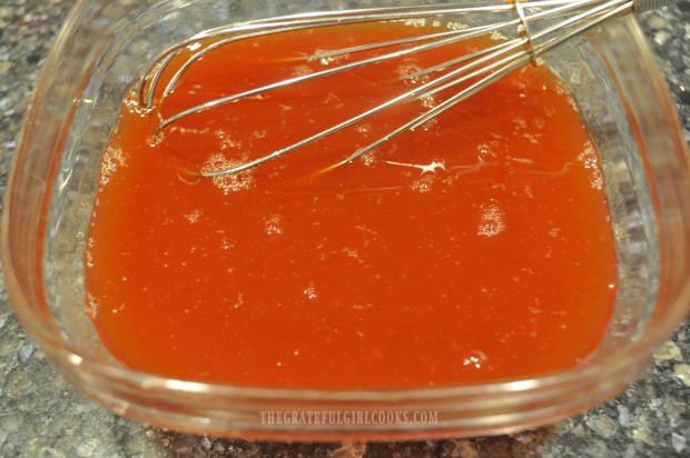 The sauce for sweet and sour pork is easily made by whisking ingredients together in dish.