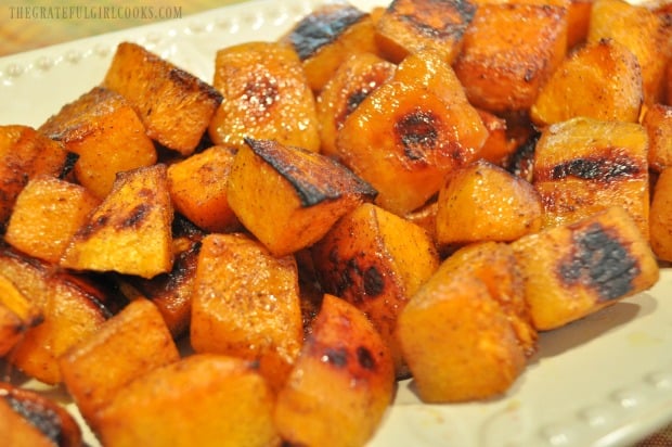 Once done, the maple cinnamon butternut squash is transferred to serving platter before serving.