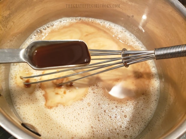 Milk and then vanilla extract are added to the pan when making Créme Brulee Coffee Creamer.