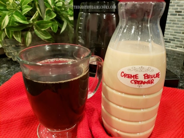 Créme Brulee Coffee Creamer, ready to add to a hot cup of coffee.