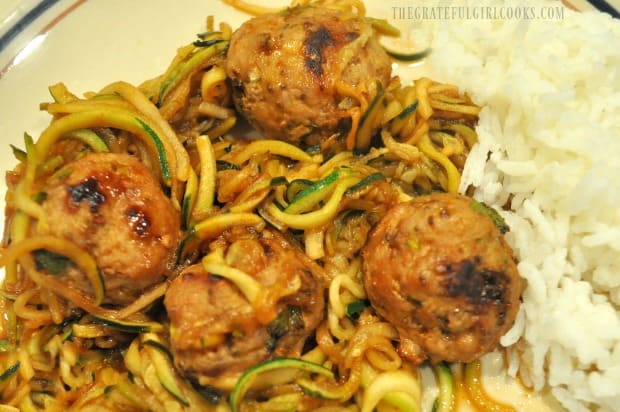 The zucchini noodles, sauce and Thai turkey meatballs are served, along with rice on the side.