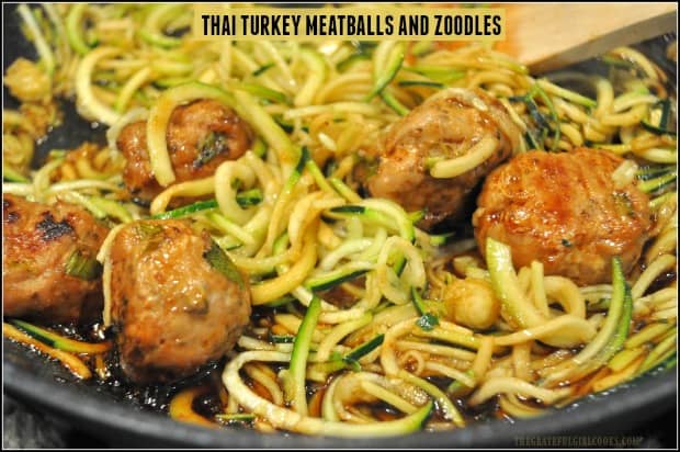 Thai turkey meatballs are baked, then combined with spiralized zucchini noodles, and covered with a soy/sriracha/lime/honey glaze in this yummy dish!
