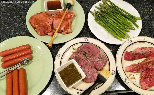 The seasoned asparagus is ready to grill, along with other meats.