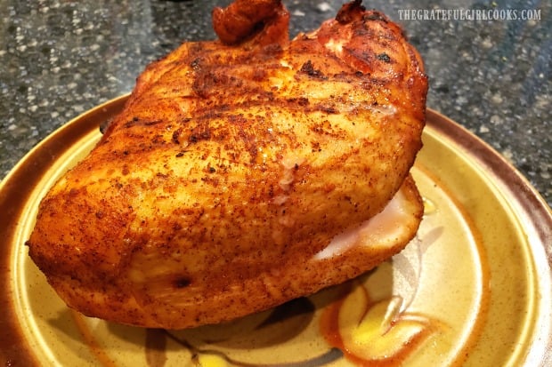 The turkey breast rests after cooking, and before slicing.