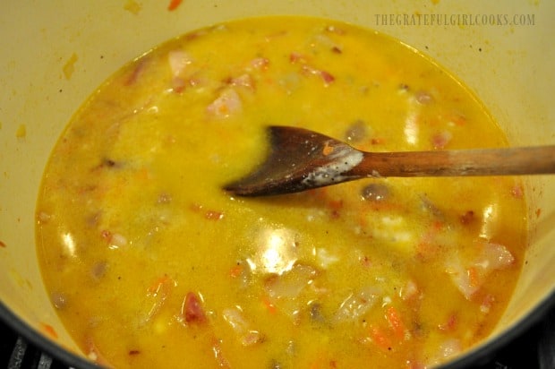 Mushrooms, cream of mushroom soup, water and seasoning cook in large saucepan.