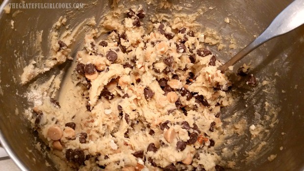 Chocolate chips, peanut butter chips and pecans are added to double chipper cookies dough