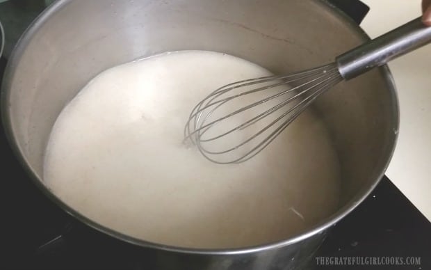 Water, sugar and Clear Gel cooking in a pan.