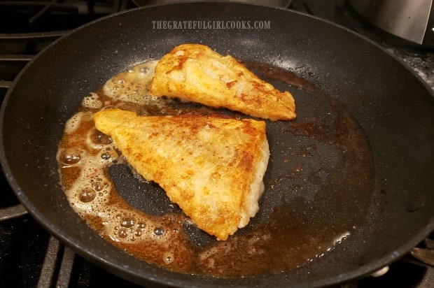 The cod has been cooked on both sides in browned butter.