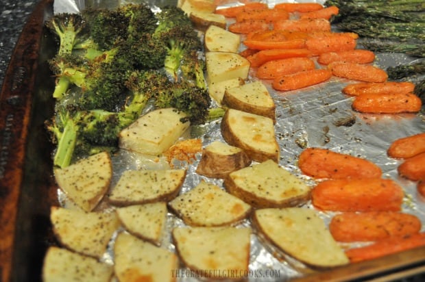 Potato slices, broccoli and carrots are done being oven roasted and are ready to eat!