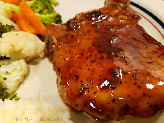 One of the skillet glazed pork chops, served with mashed potatoes and assorted veggies.