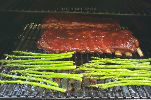 The ribs are coated with BBQ sauce, and grilled for one more hour until done!