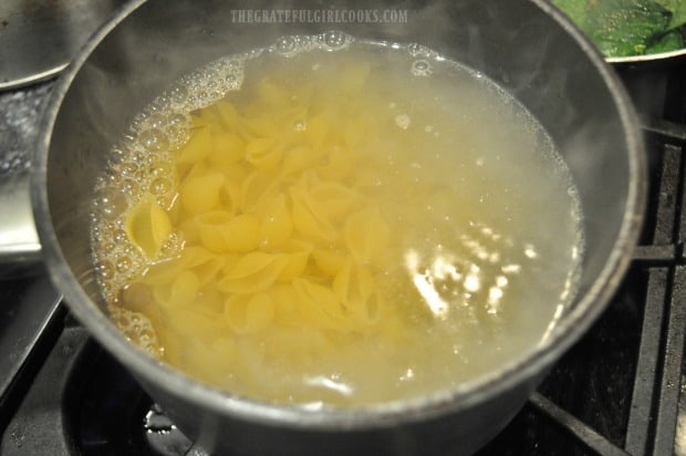 Pasta shells are cooked to add to this dish.