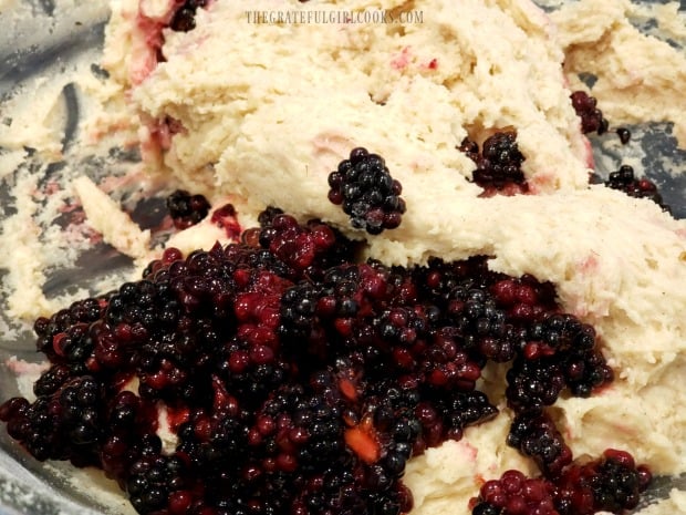 Blackberries are added to the muffin batter.
