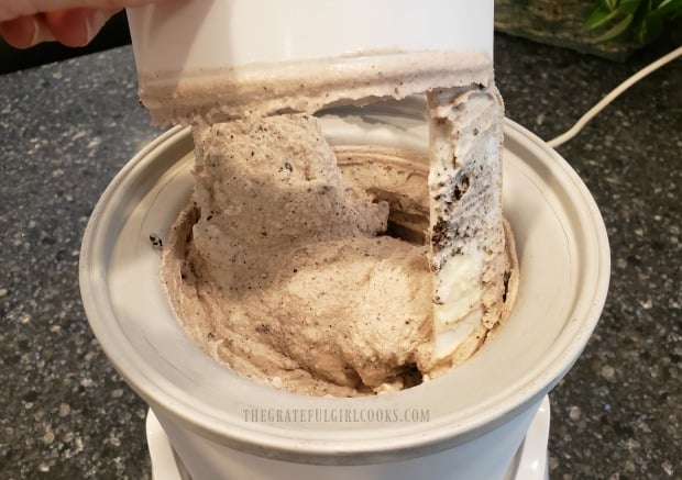 Ice cream is finished freezing, and is removed from machine.