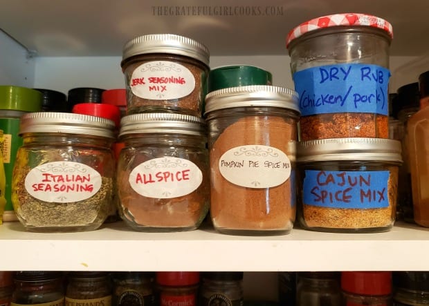 The jar of homemade allspice is added to the other spices in our pantry.