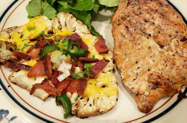 Chicken and green salad were served with the loaded grilled cauliflower.