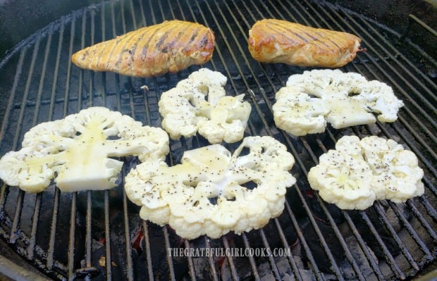 Cauliflower steaks are grilled on one side, then flipped over.