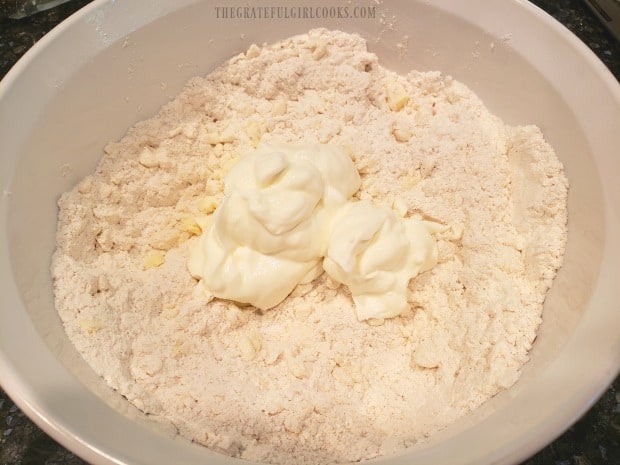 Streusel ingredients are cut together, then sour cream is added to the topping.