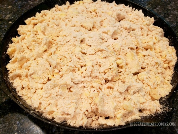 Peach Pear Blueberry Cobbler is covered with streusel topping before cooking.