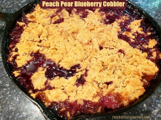 Make a delicious peach pear blueberry cobbler with a streusel topping on a Traeger, pellet grill, or in an oven! Perfect with a scoop of ice cream!