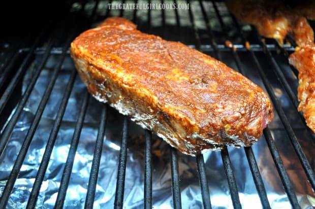 Smoked Chili Rib Eye Steaks are smoked for 45 minutes on grill.